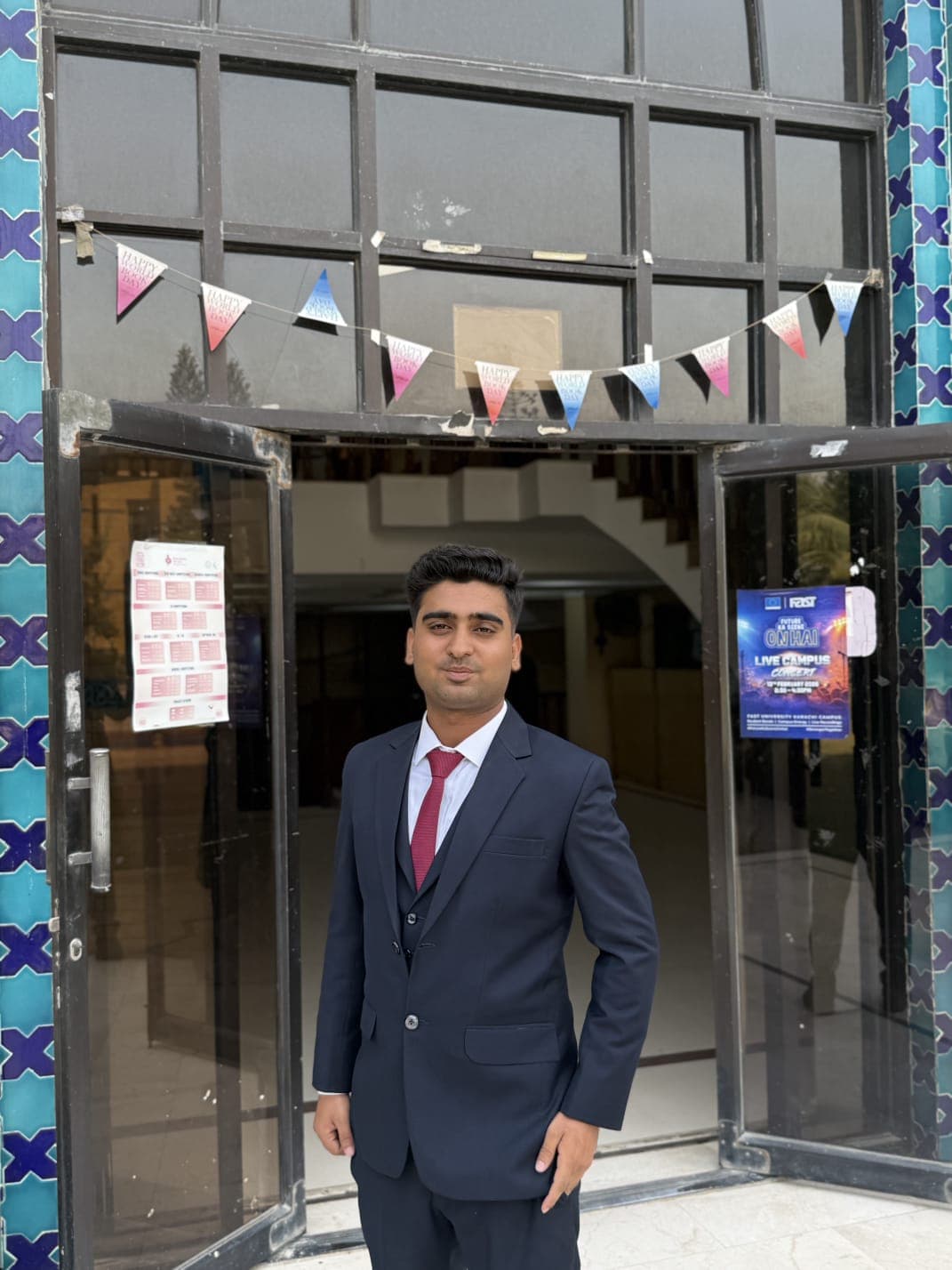 Muneeb Ur Rehman at the FAST University Karachi campus entrance